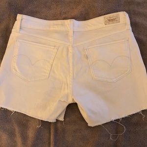 Levi white cut off jean shorts